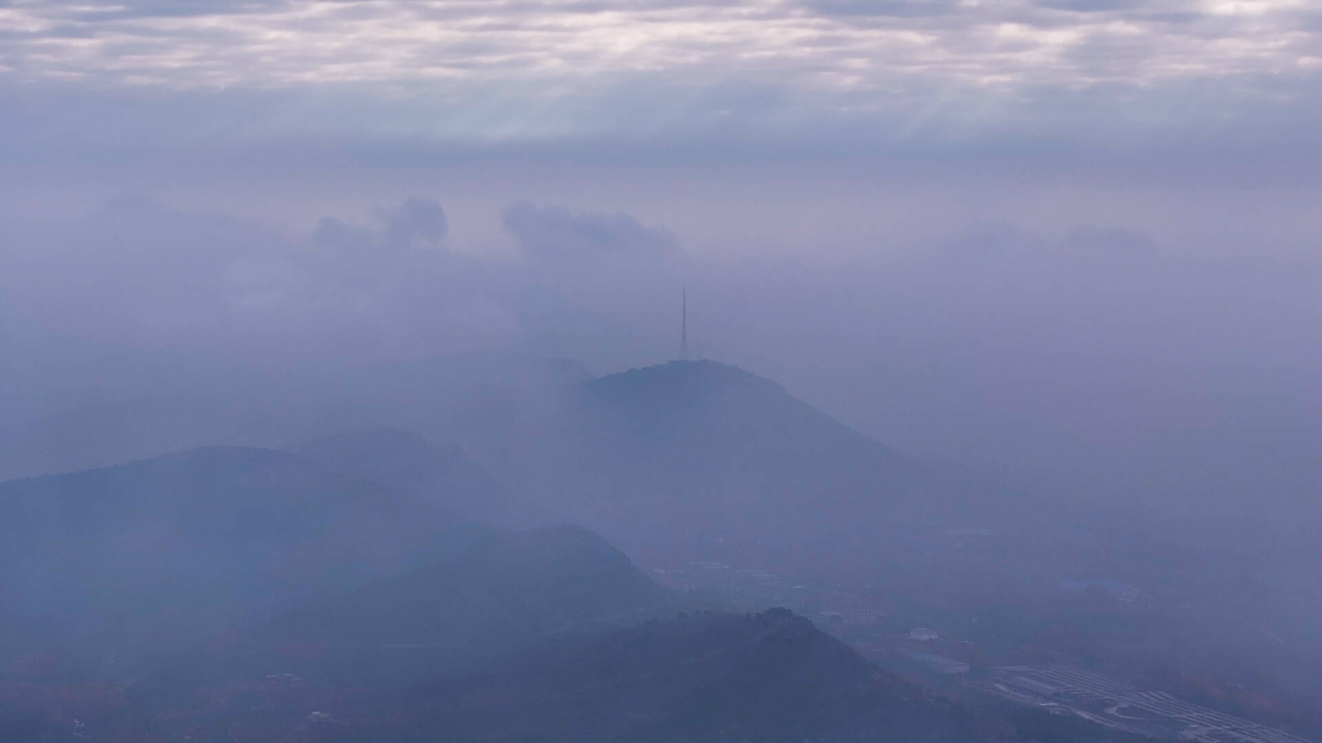 诗画山东丨冬雨过后枣庄湿漉漉，新城雾气蒙蒙似画卷